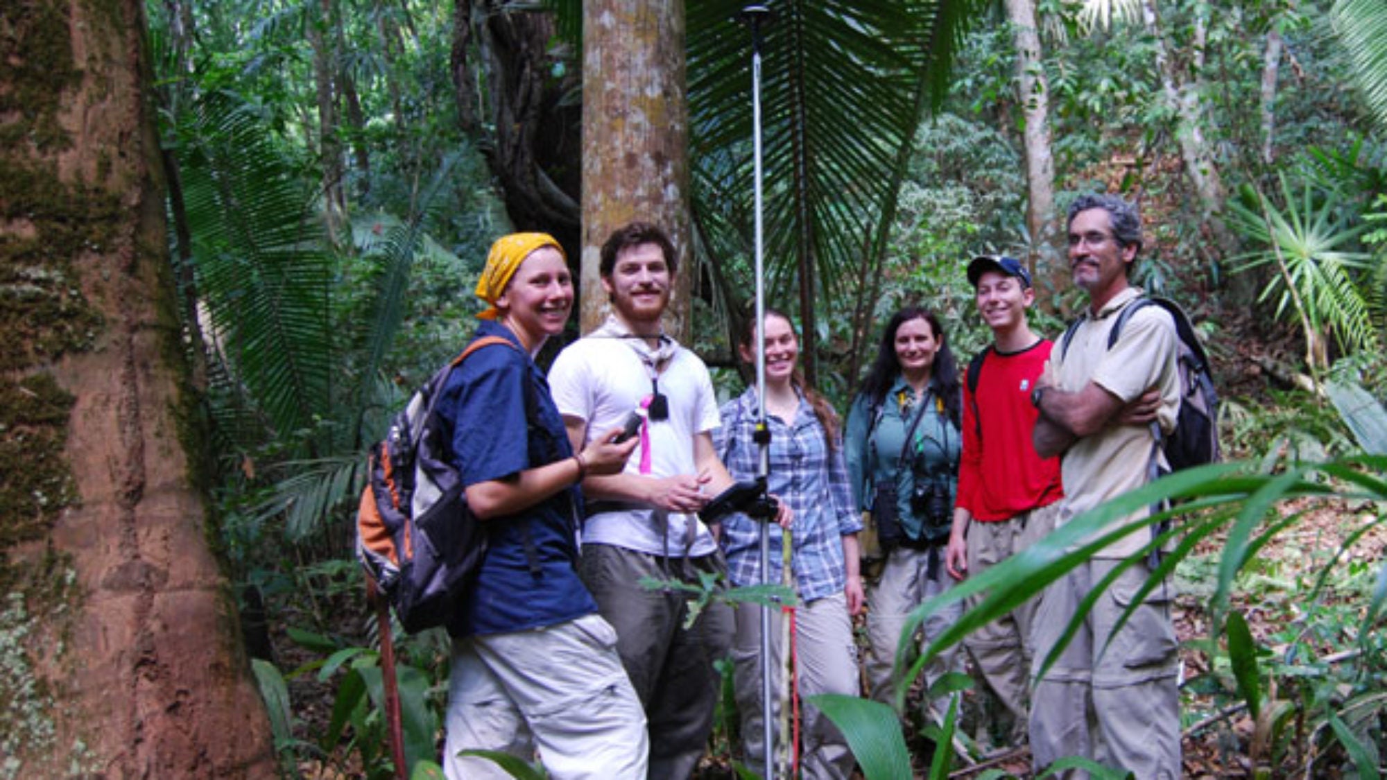Tim Beach in the jungle with students, others