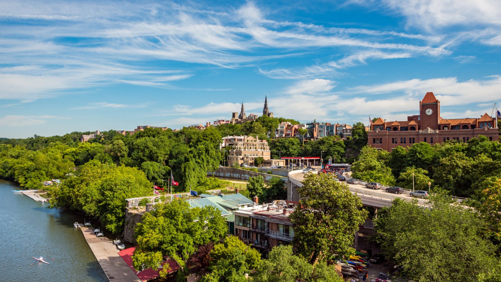 The Georgetown waterfront is framed by a large blue sky.