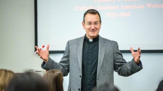 Mark Bosco, S.J. speaks to a class.