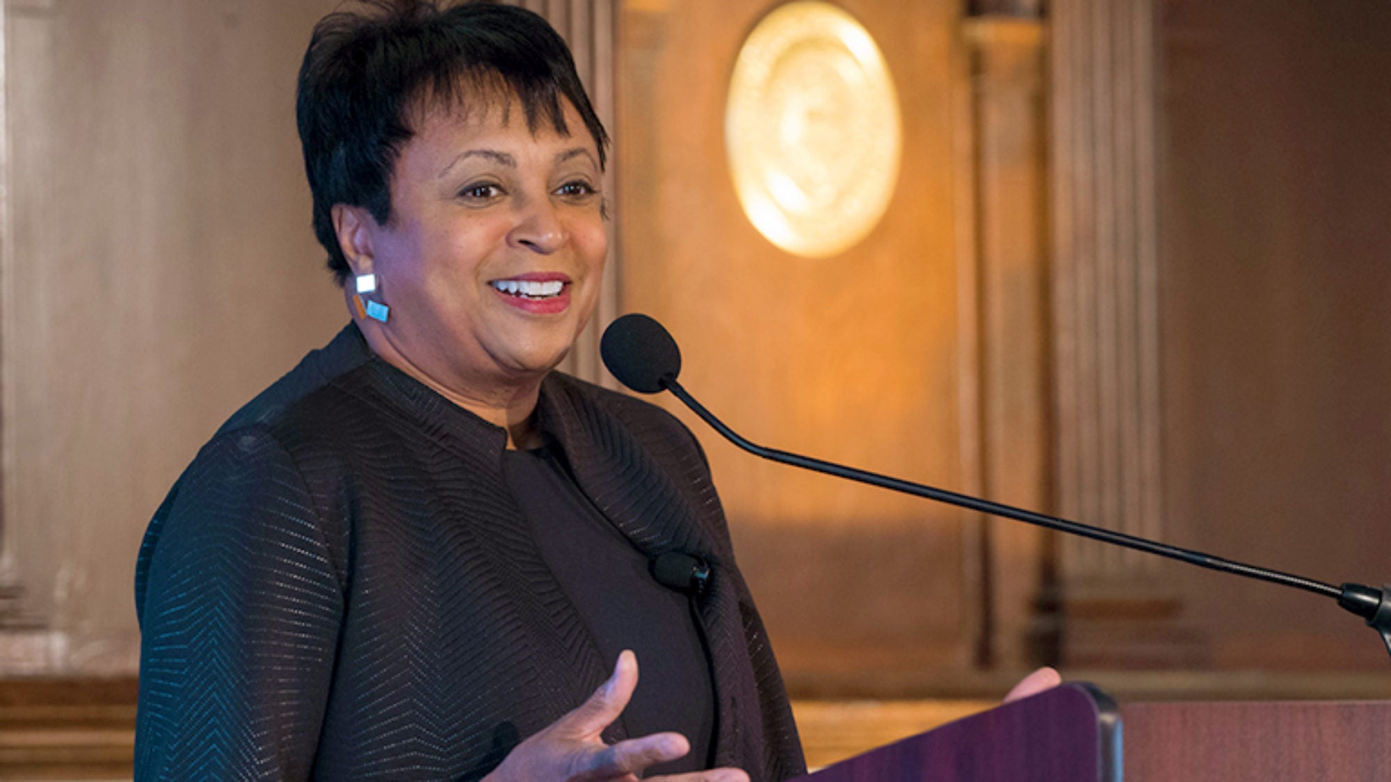 Carla Hayden speaks into microphone