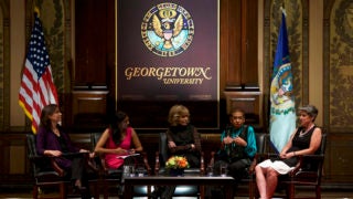 Lane Windham, Saru Jayaraman, Jane Fonda, Eleanor Holmes-Norton and Elissa Silverman on stage in Gaston Hall