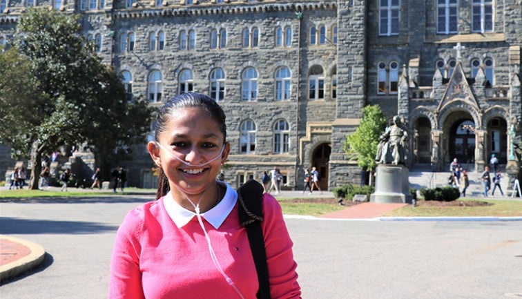 Shavini Fernando in front of Healy Hall