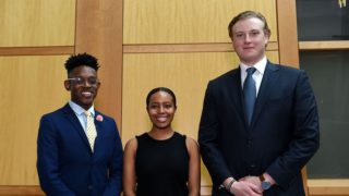 Kendell Long, Taylor Riddick and Alex Buffone standing