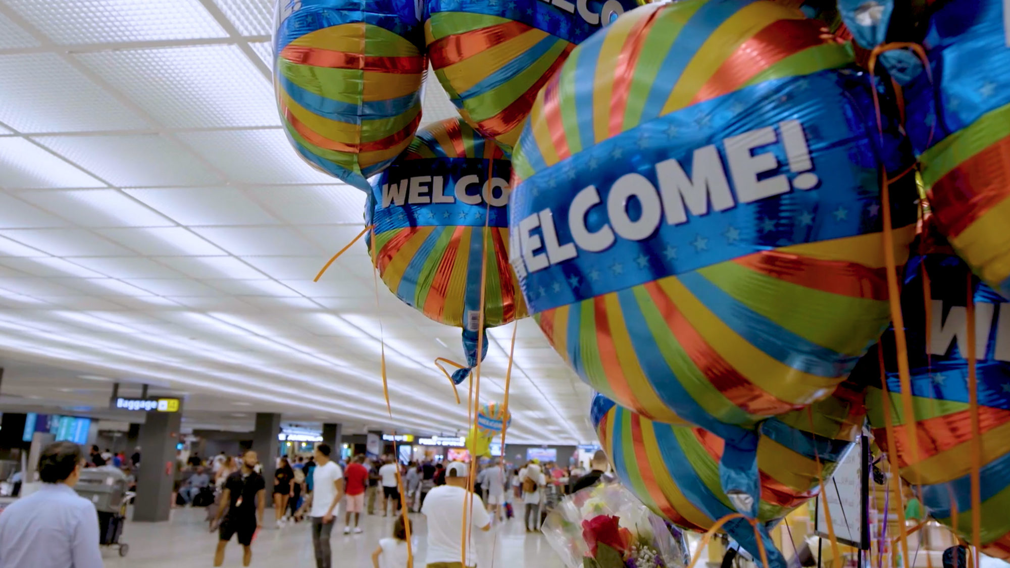 Welcoming balloons float at Dulles Airport