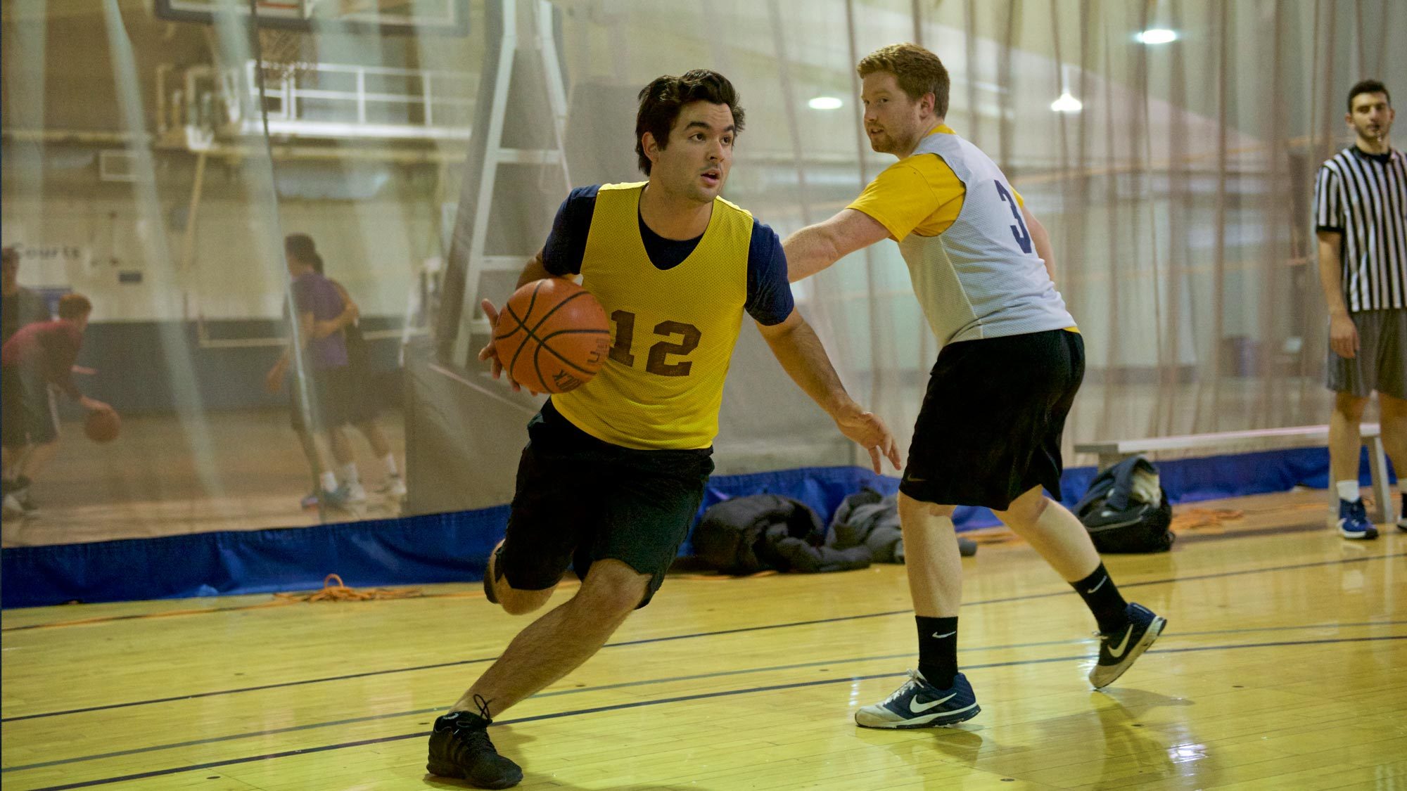 Students play basketball