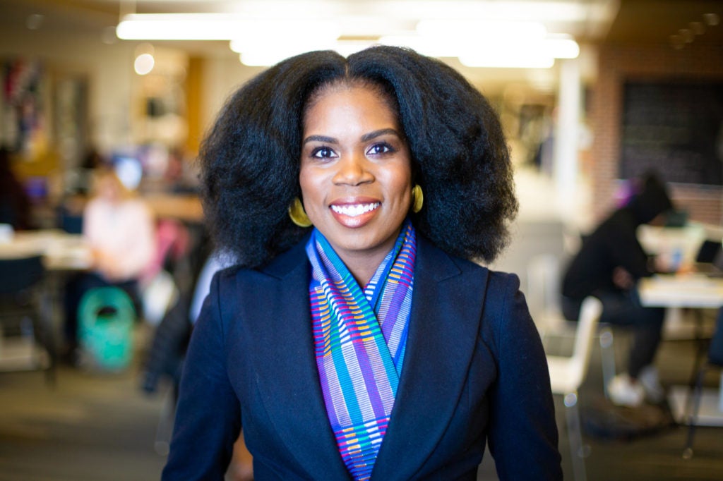 Adanna Johnson poses in an office.