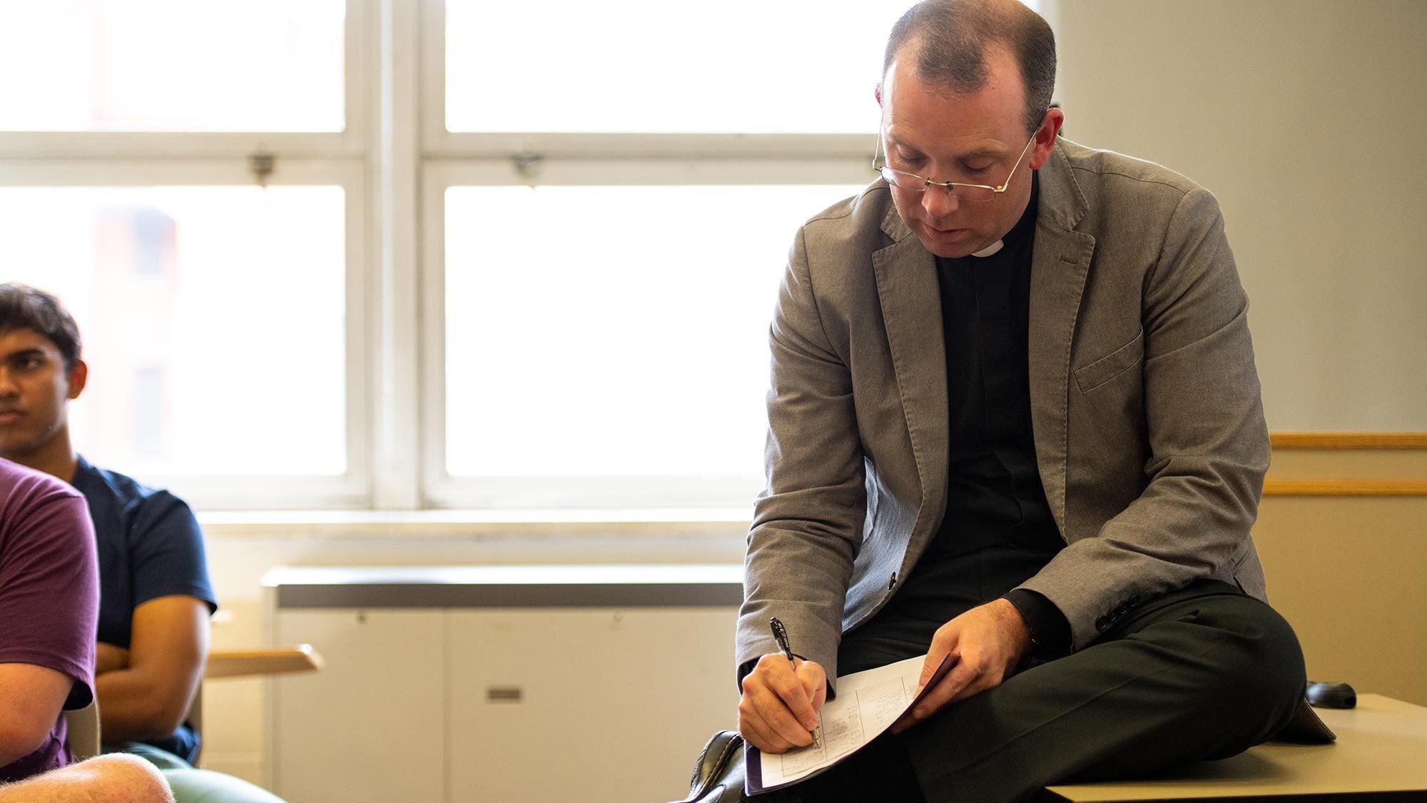Fr. Peter Folan teaches a class