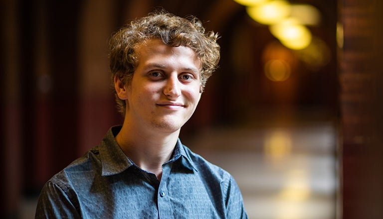 Paul Rochford in Healy building hallway