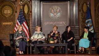 A panel in Gaston Hall featuring Hillary Clinton.