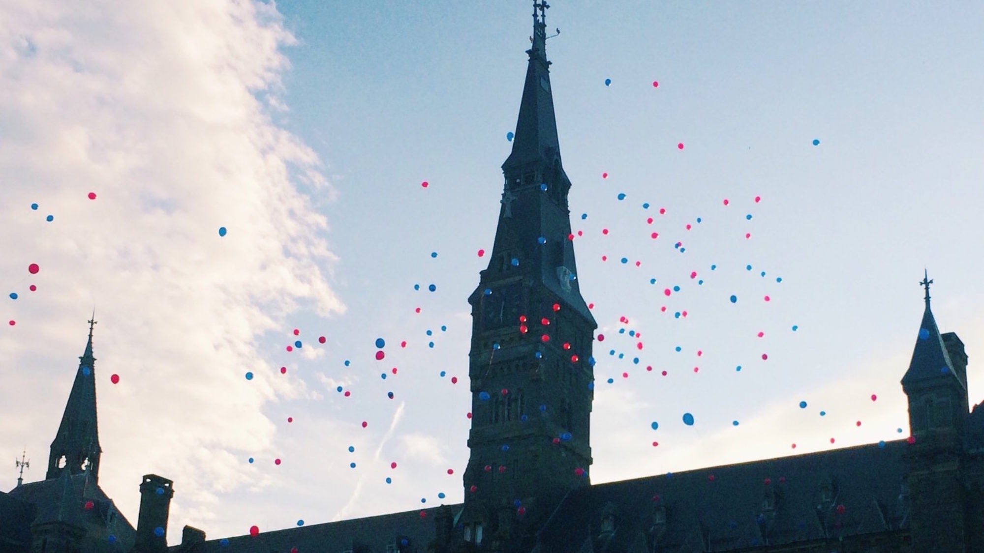 Balloons float over Healy Hall