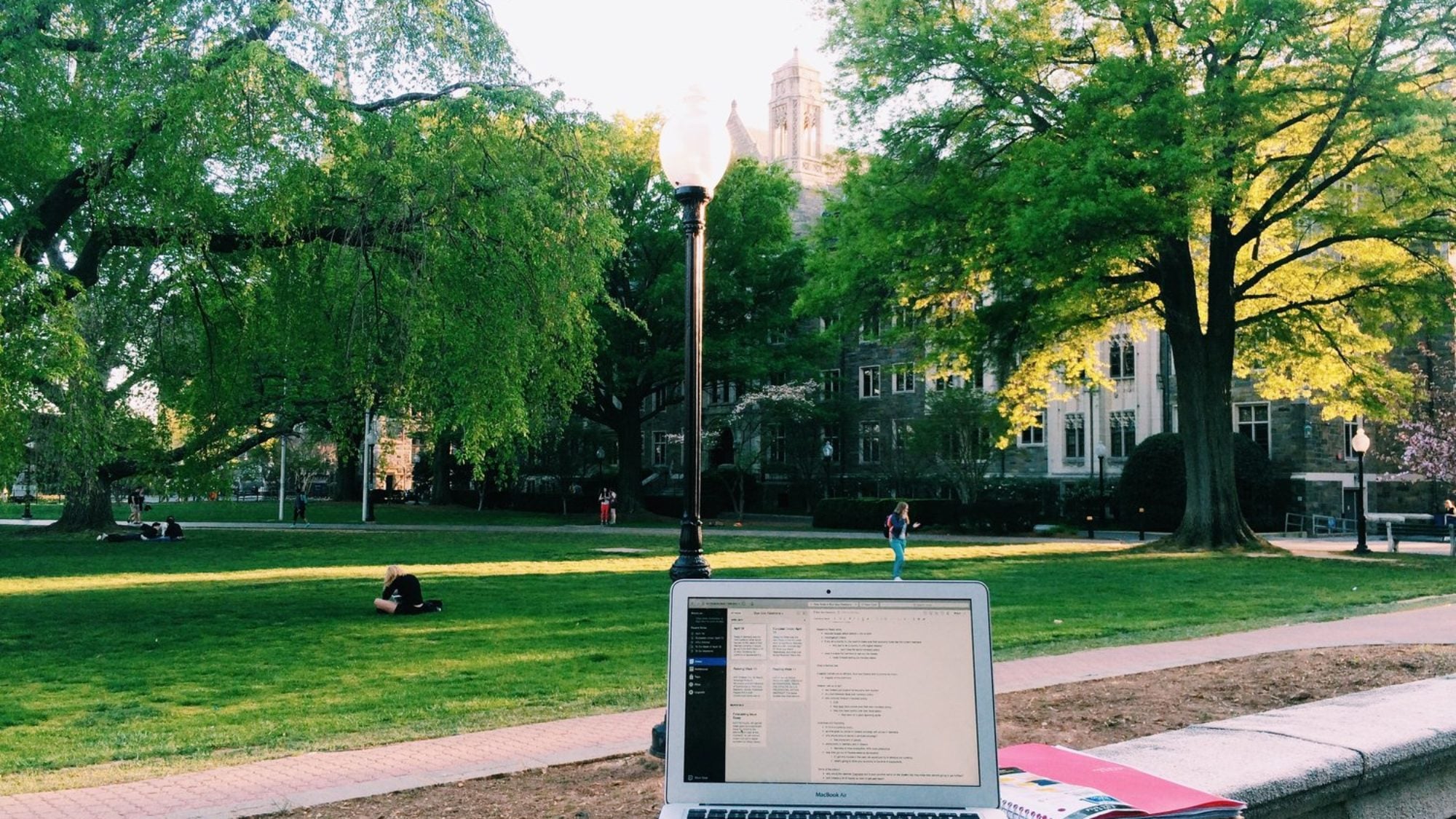 An open laptop sits near White Gravenor Hall