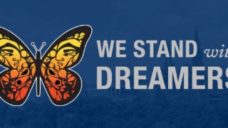 Graphic of a butterfly with Healy Building behind it and the words &quot;We Stand With Dreamers.&quot;