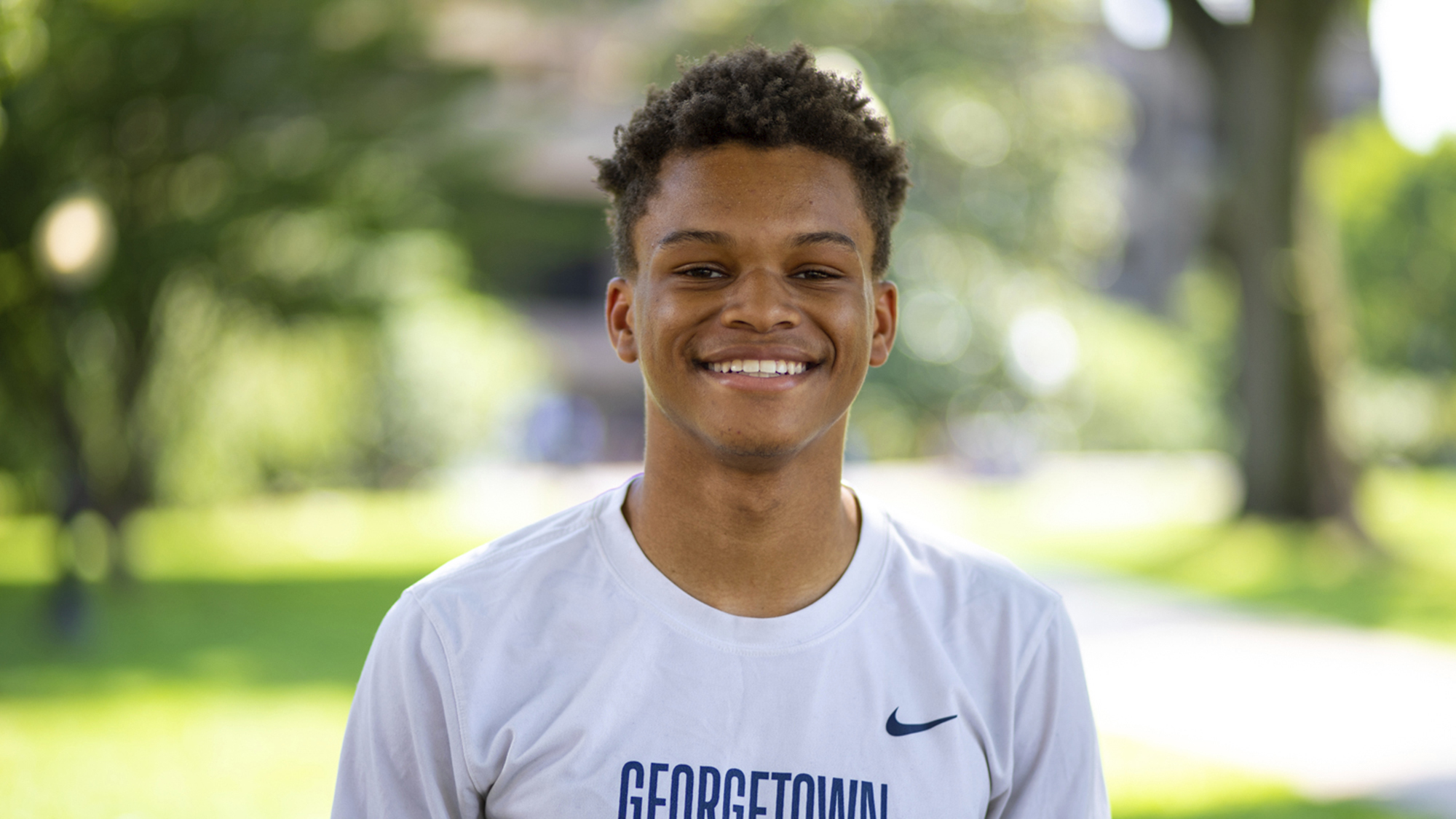 Josiah Laney wearing a Georgetown track and field T-shirt