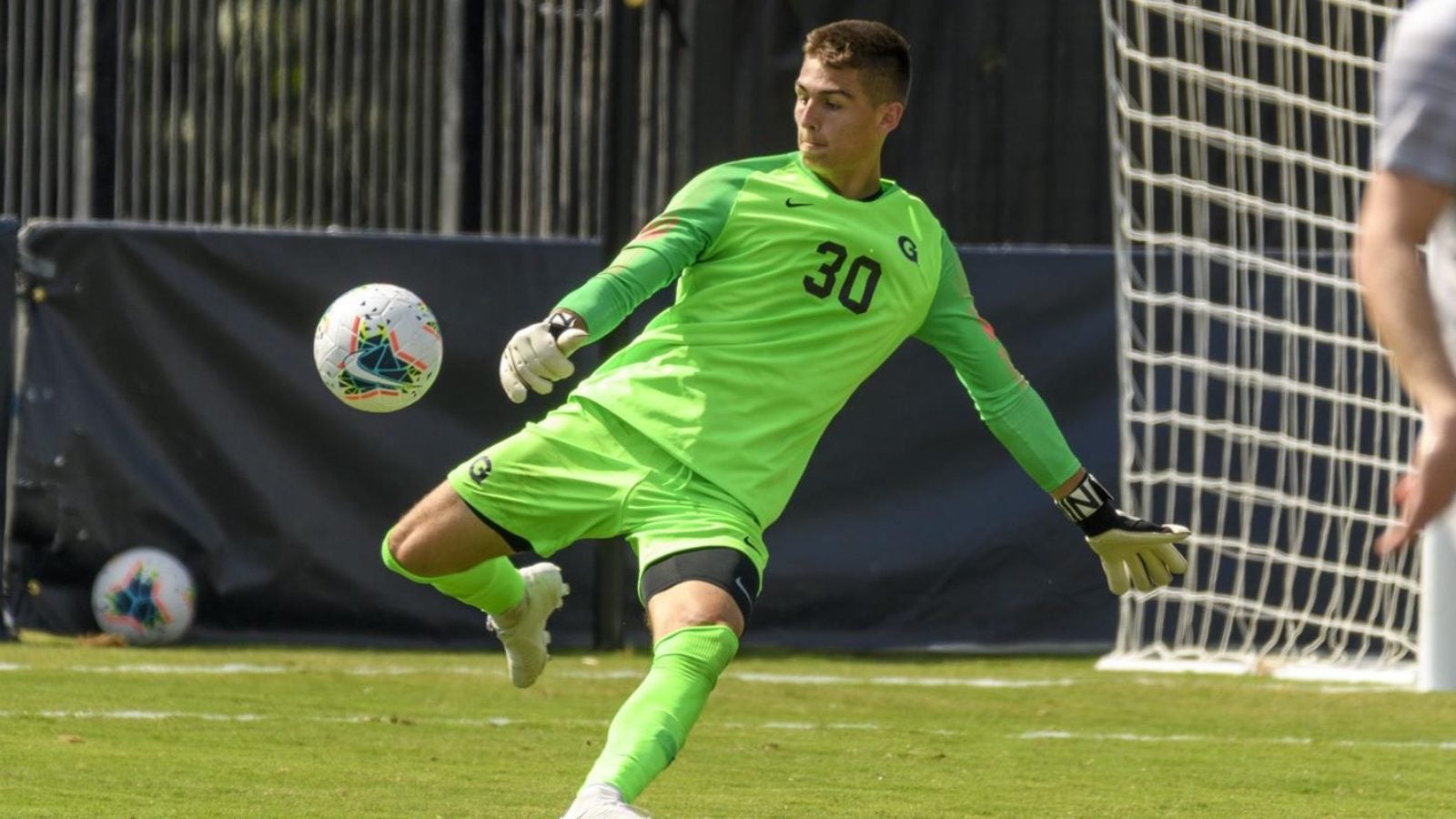 Tomas Romero kicking a soccer ball