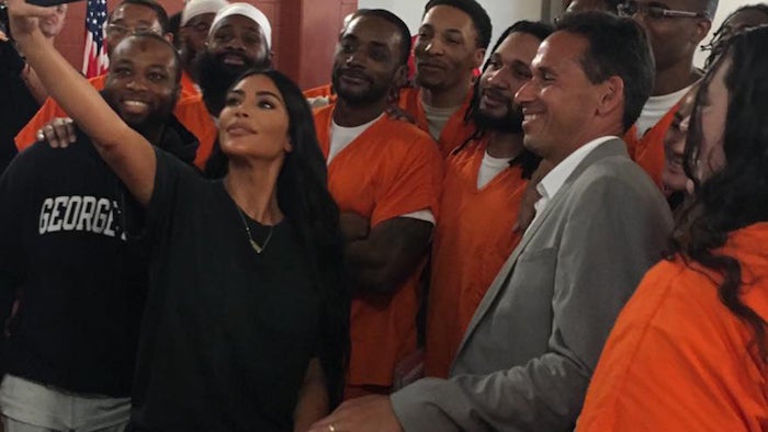 Kim Kardashian takes a selfie with participants in the Prison Scholars Program and Professor Marc Howard