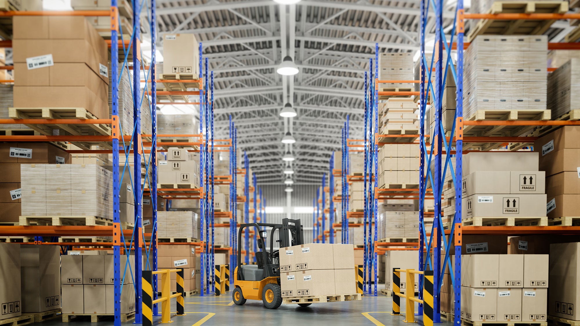 Boxes stackes in aisles in a warehouse.