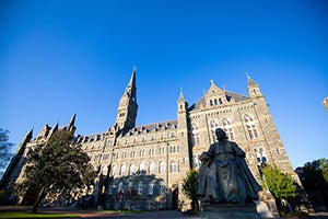 Healy Building with the John Carroll statue in front of it.