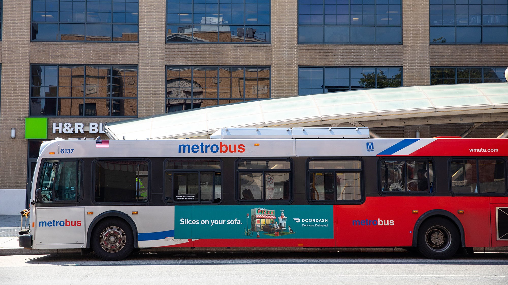 A DC Metrobus makes a stop in the city.