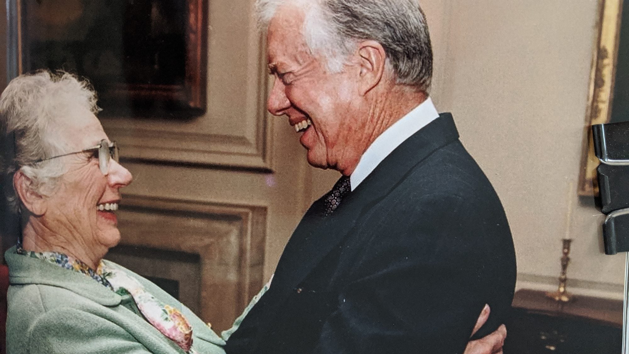 Lillian Brown and President Jimmy Carter smile at one another