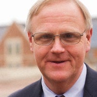 Dr. Todd Olson in an outdoor photo on the Leavey Esplanade