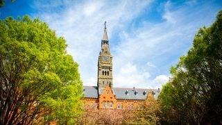 Healy Hall from Dahlgren Quad framed by two trees