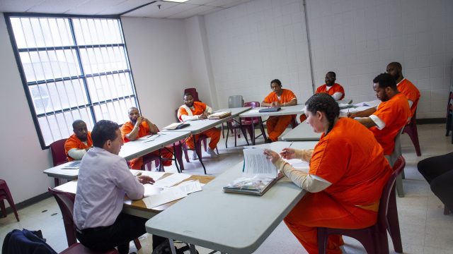 Marc Howard teaching course to incarcerated individuals