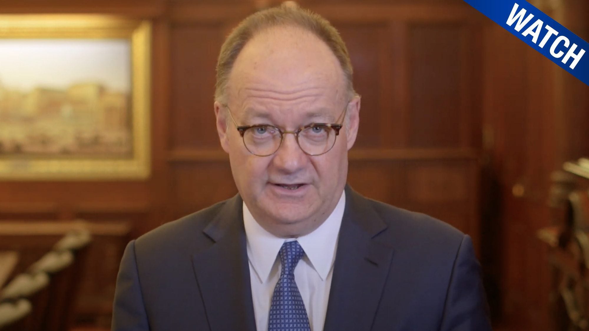 President DeGioia addresses the importance of mental well-being from his office with the text &quot;Watch&quot; in the top right corner