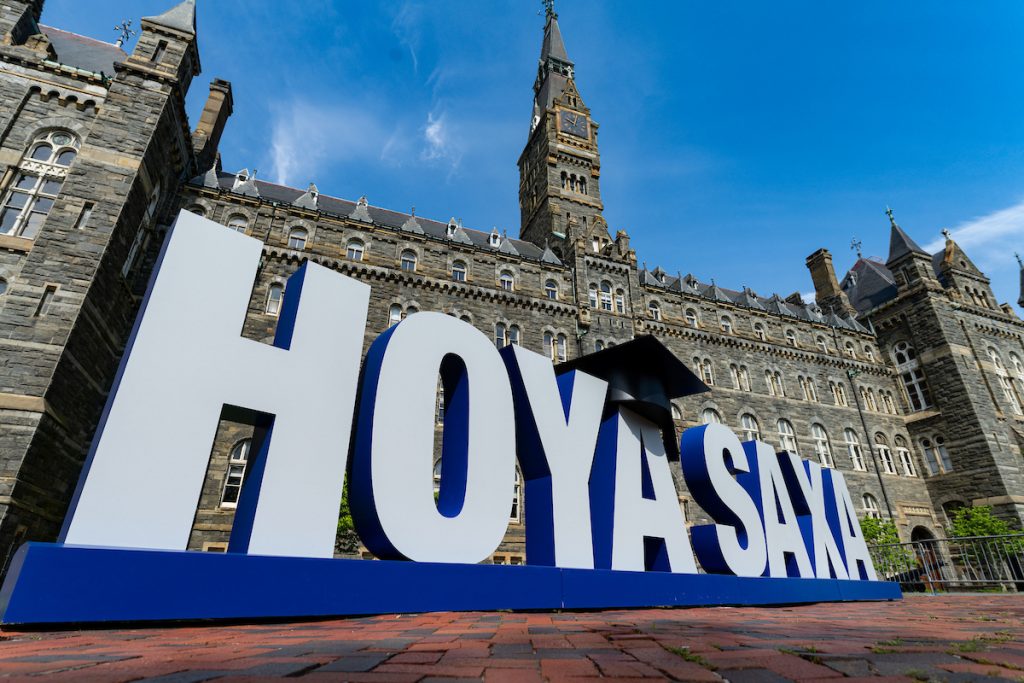 Large letters reading "Hoya Saxa" in front of Healy Hall