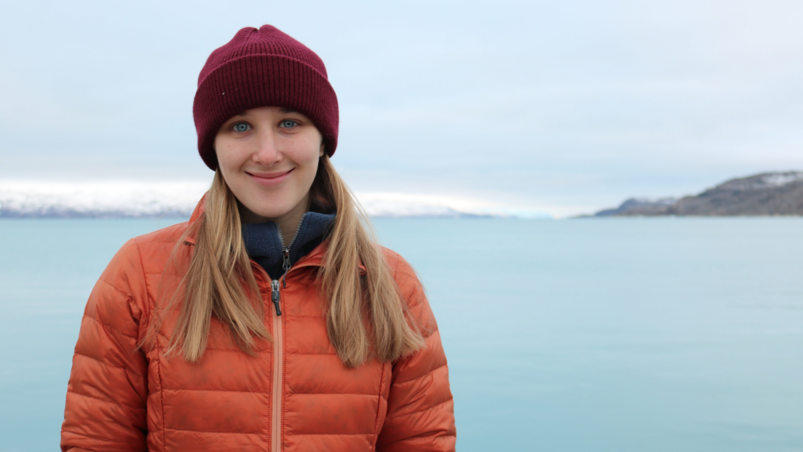 Laura Ratliff in front of a lake in Kangerlussuaq, Greenland