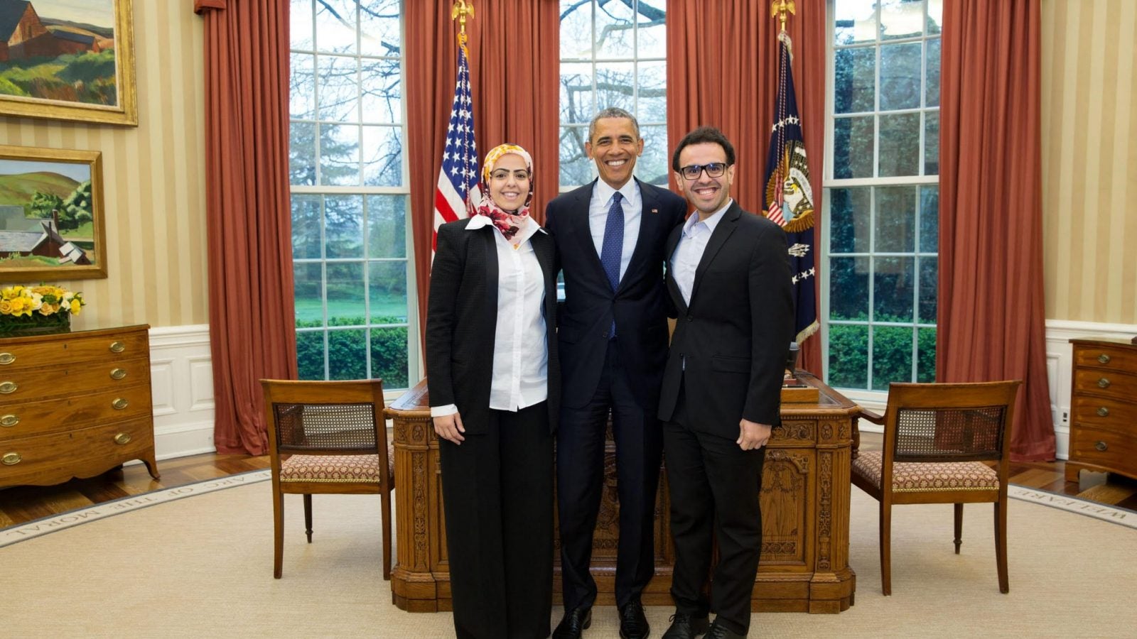 Soltan (right) with President Obama in the Oval Office