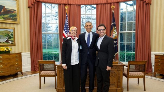 Soltan (right) with President Obama in the Oval Office