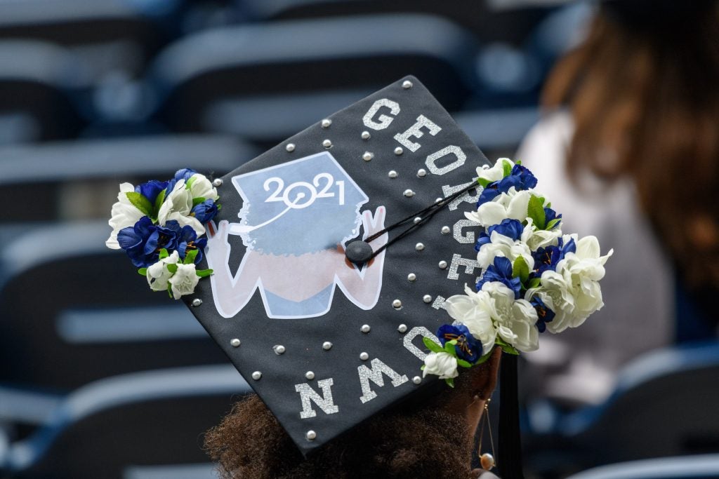 Graduate wearing a decorated graduation cap