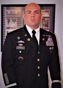 Timothy Torres wears dress Army uniform