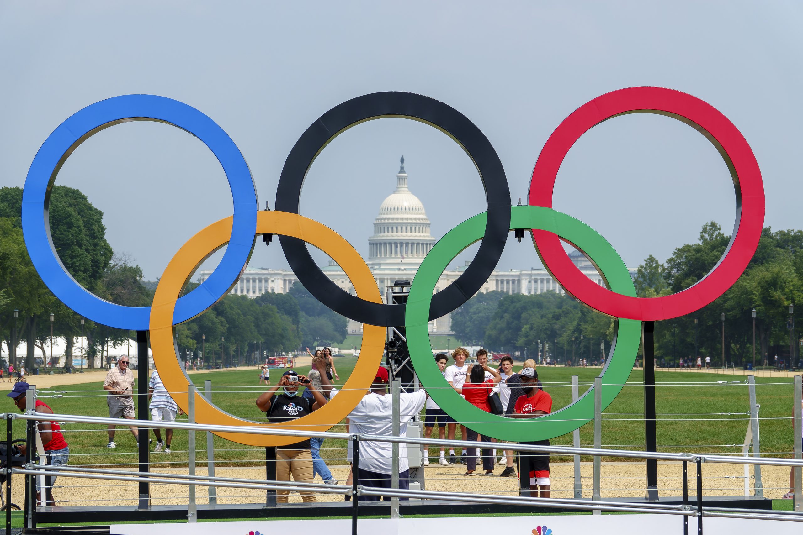 Capitol Building in the background of intersection five large Olympic rings