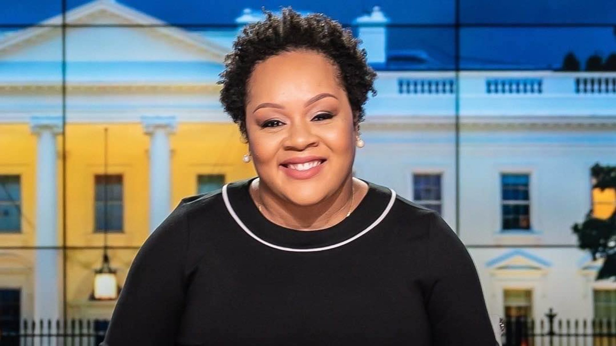 Yamiche Alcindor in front of green screen White House