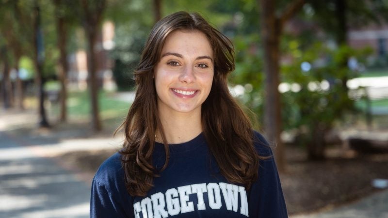 Ava Culoso wears a Georgetown sweatshirt