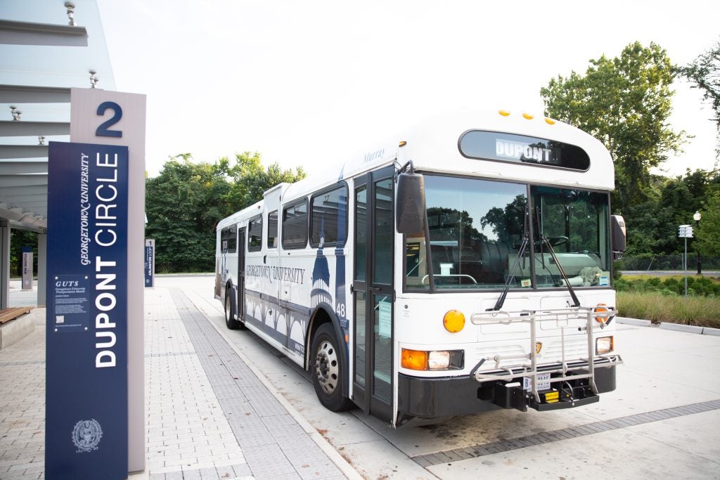 GUTS bus at a bus stop