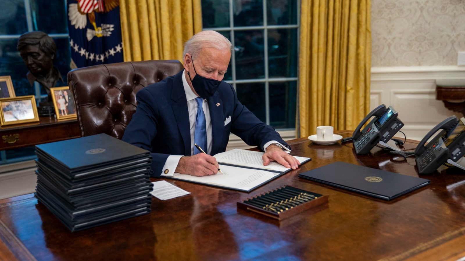 President Biden signs an executive order.