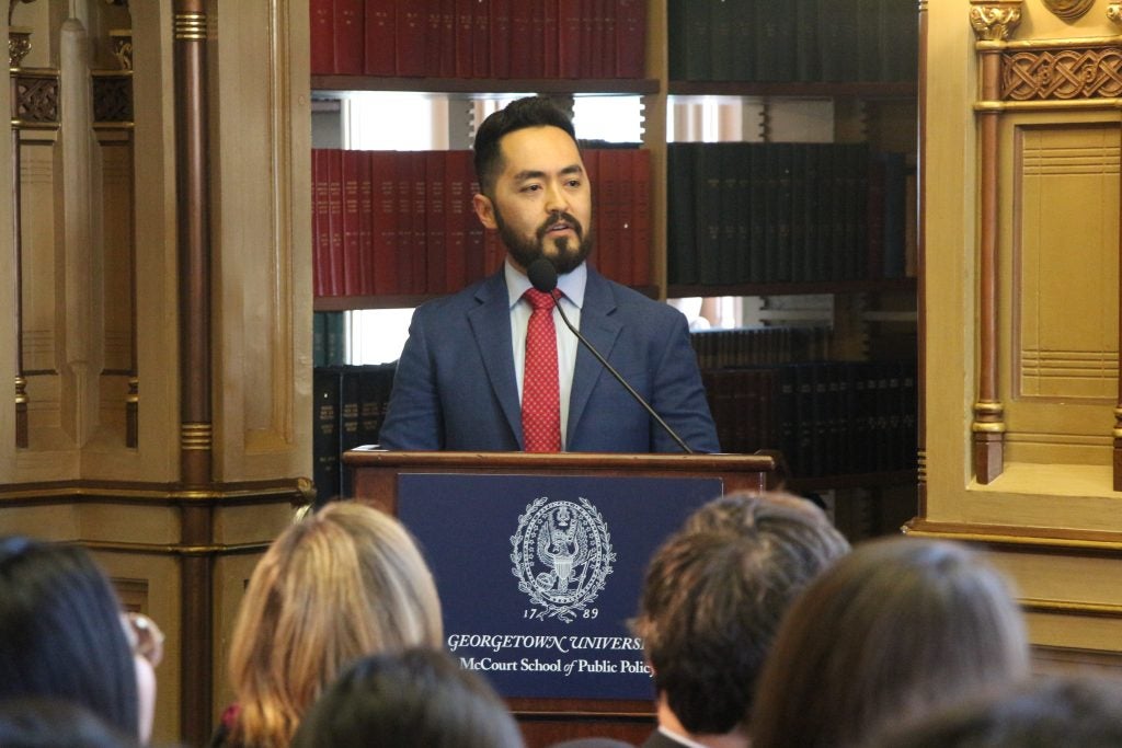 Shuja speaks at a launch event for the Georgetown Public Policy Review.