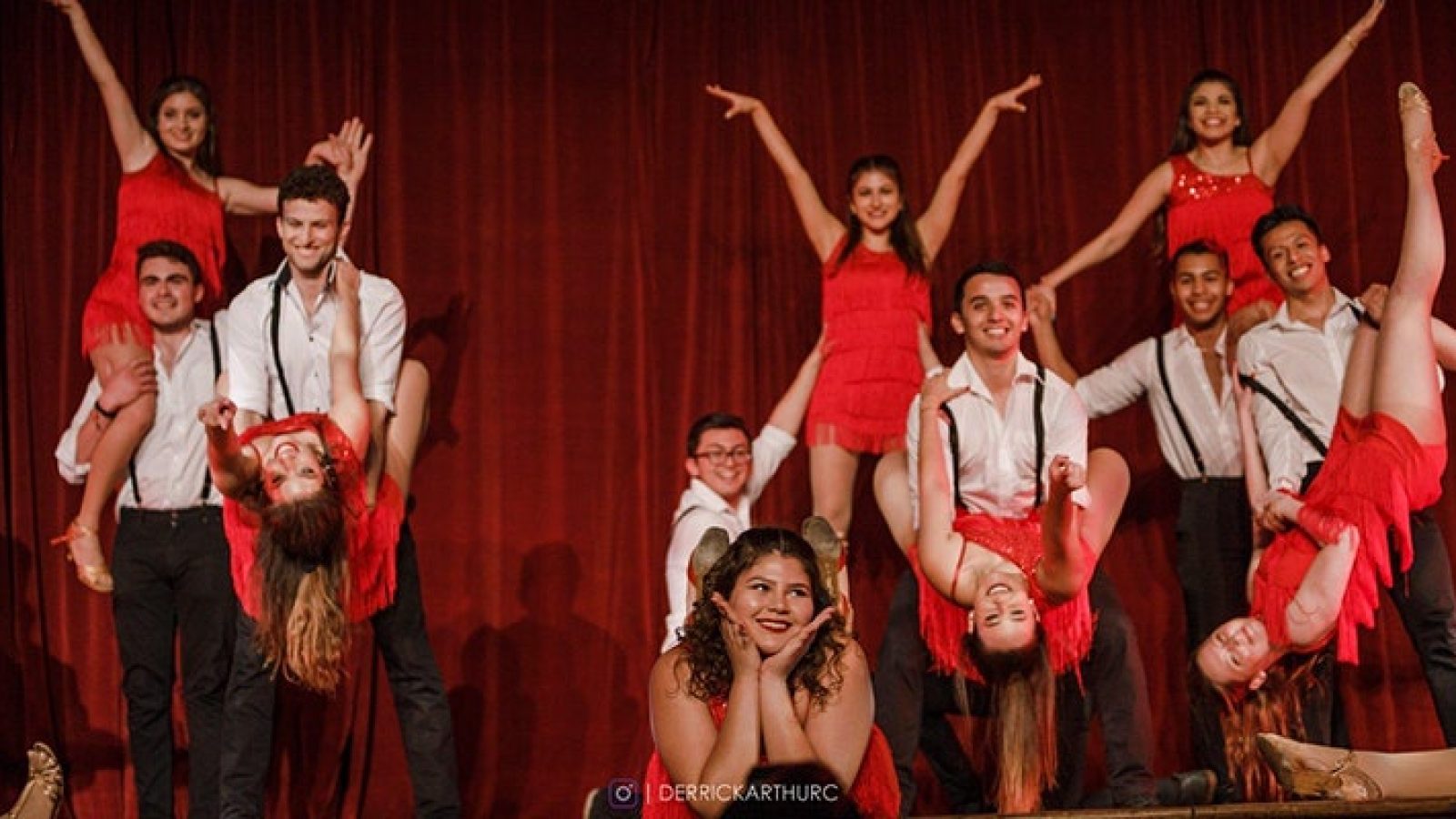 A Group of male and female dancers on stage