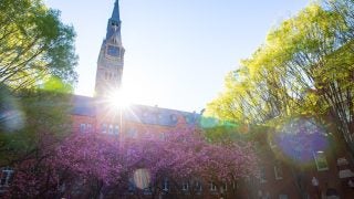 An image of Healy Hall at sunrise.