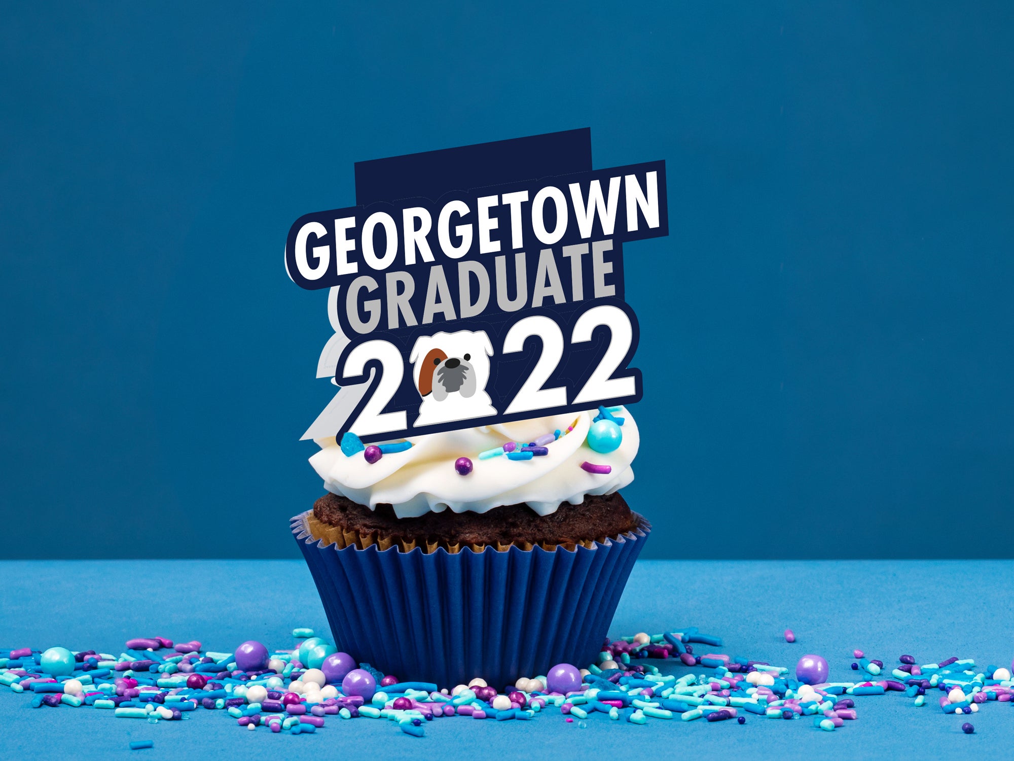 Cupcake with a topper that says Georgetown Graduate 2022," with Jack the Bulldog as the zero