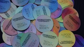 Multicolored stickers with the text &quot;Georgetown University Tech &amp; Society&quot;