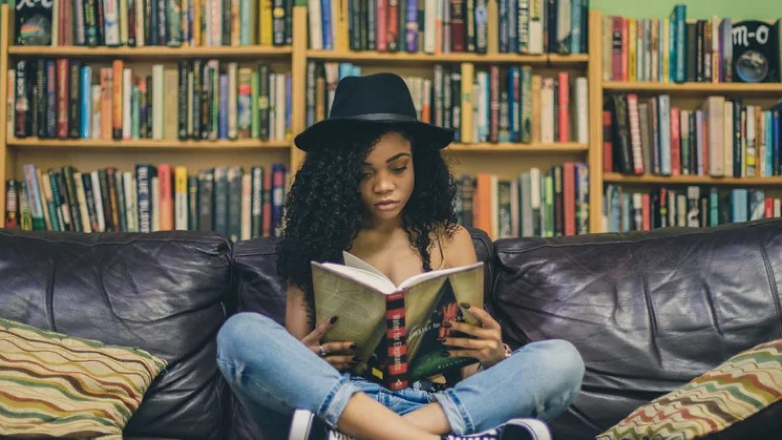 An image of a student reading a book.
