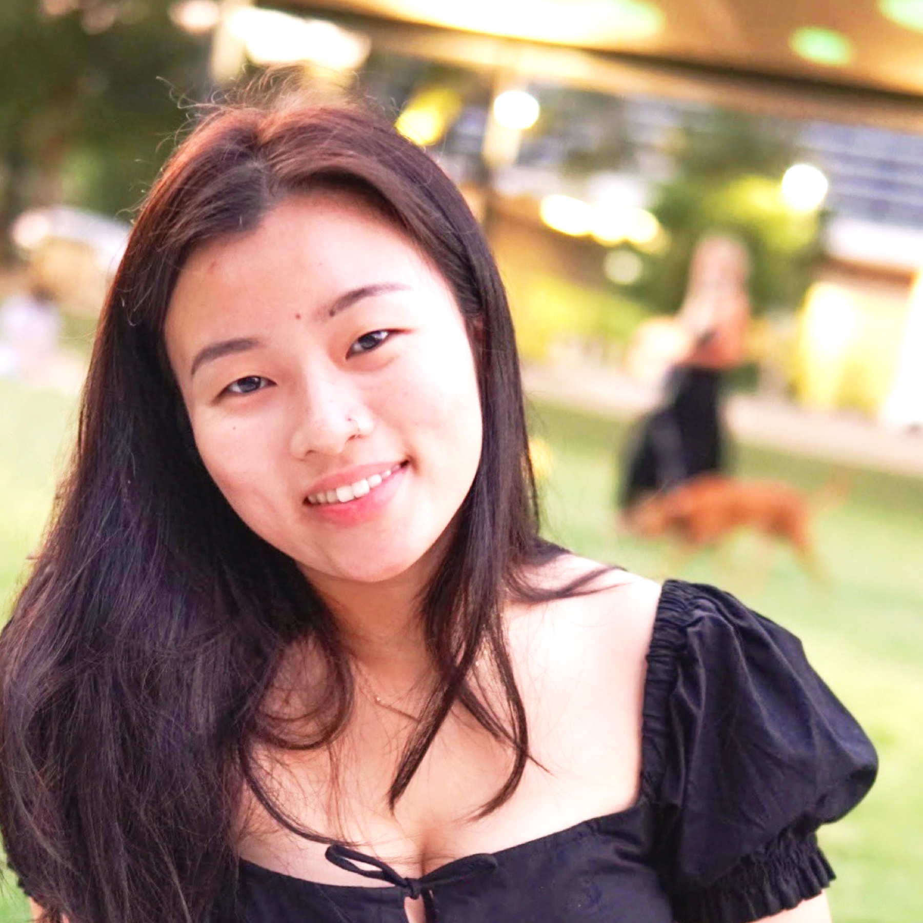 Heather Yu Huang wears a black shirt outside