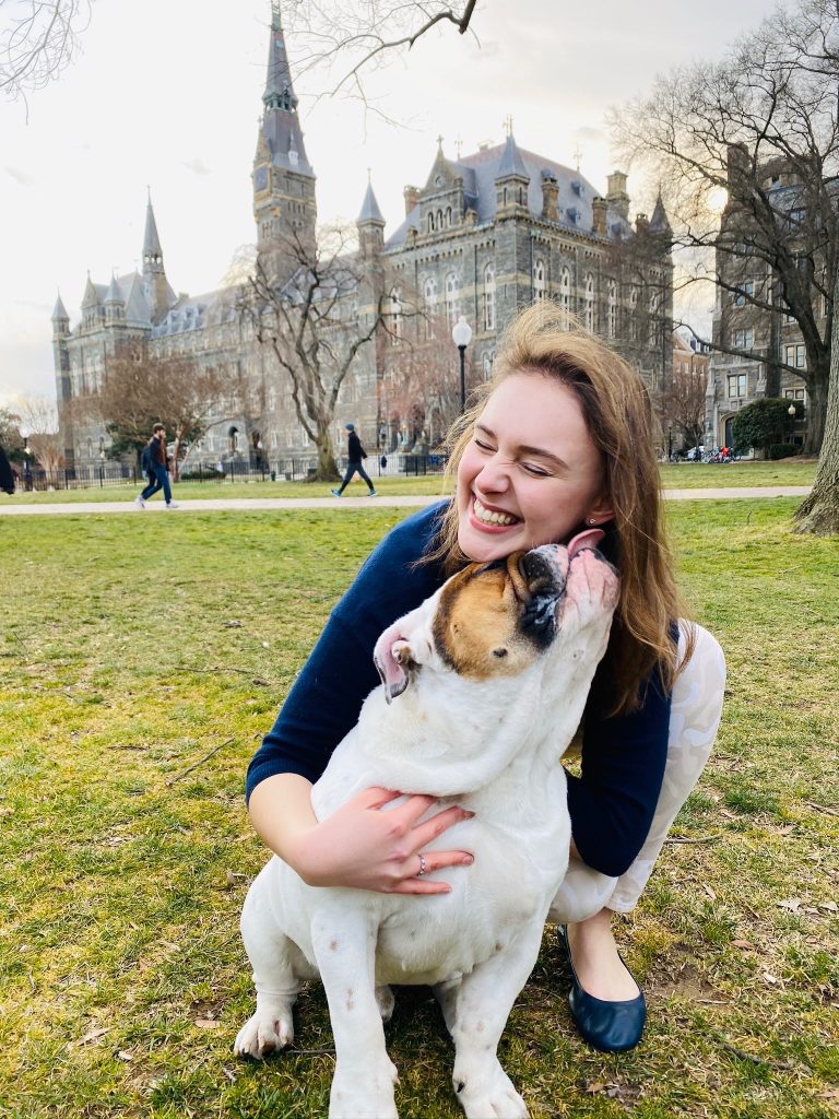 Jack licks Amelia's face in front of Healy Hall