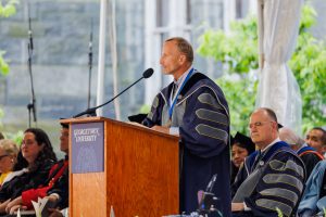 Dr. Mark Dybul speaks at the graduate and professional ceremony for the Class of 2020 on May 28.