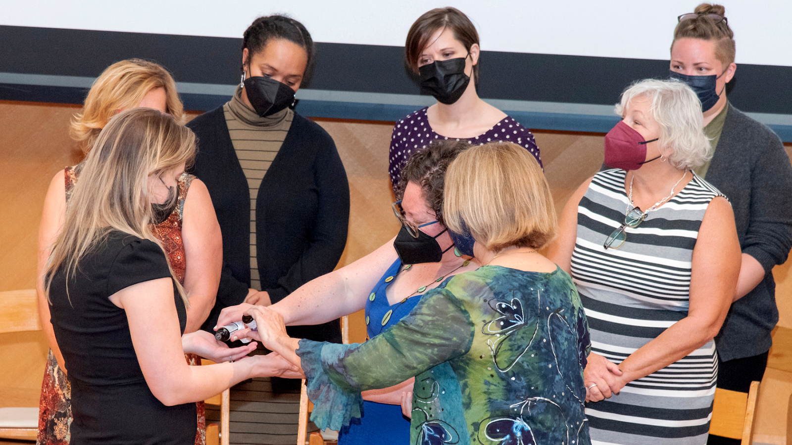 Students received a blessing of the hands at the School of Nursing &amp; Health Studies