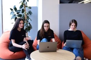 Mikadze (left) pictured with two colleagues at Movadex’s headquarters in Lviv, Ukraine.