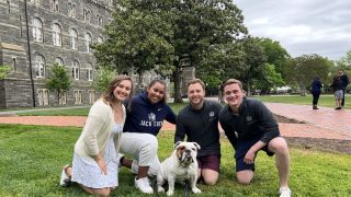 Students with Jack the Bulldog on Healy Lawn